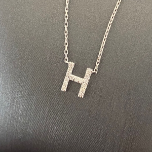 0.07 CT Pırlanta H Harf Kolye